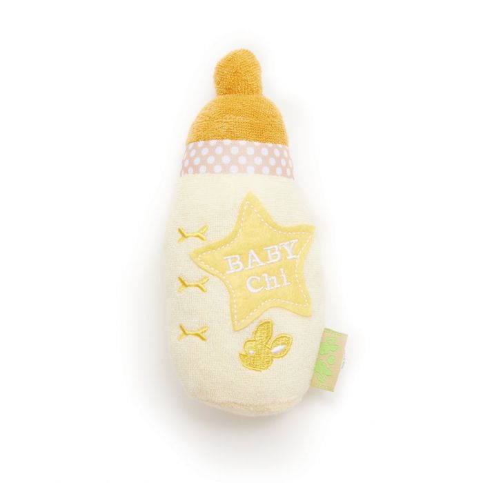 A dog toy that looks like a yellow baby bottle