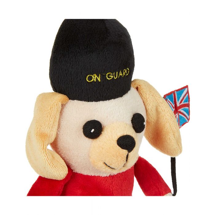 A head shot of a British royal guard dog toy