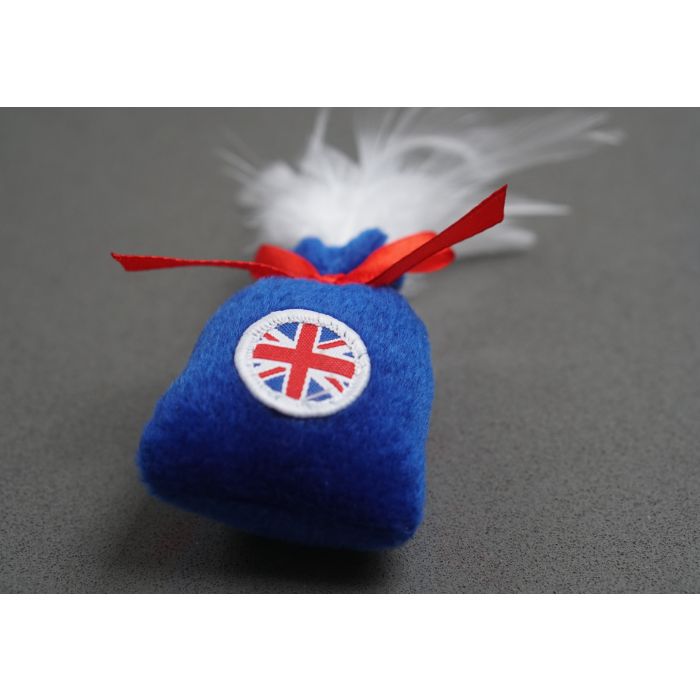 A side profile shot of a catnip sac toy for cats with British design on it