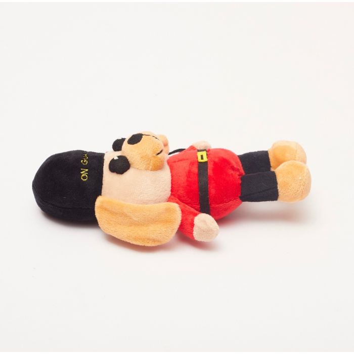 The side profile of a British royal guard dog toy